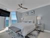 Primary Bedroom with King Bed and Balcony Access