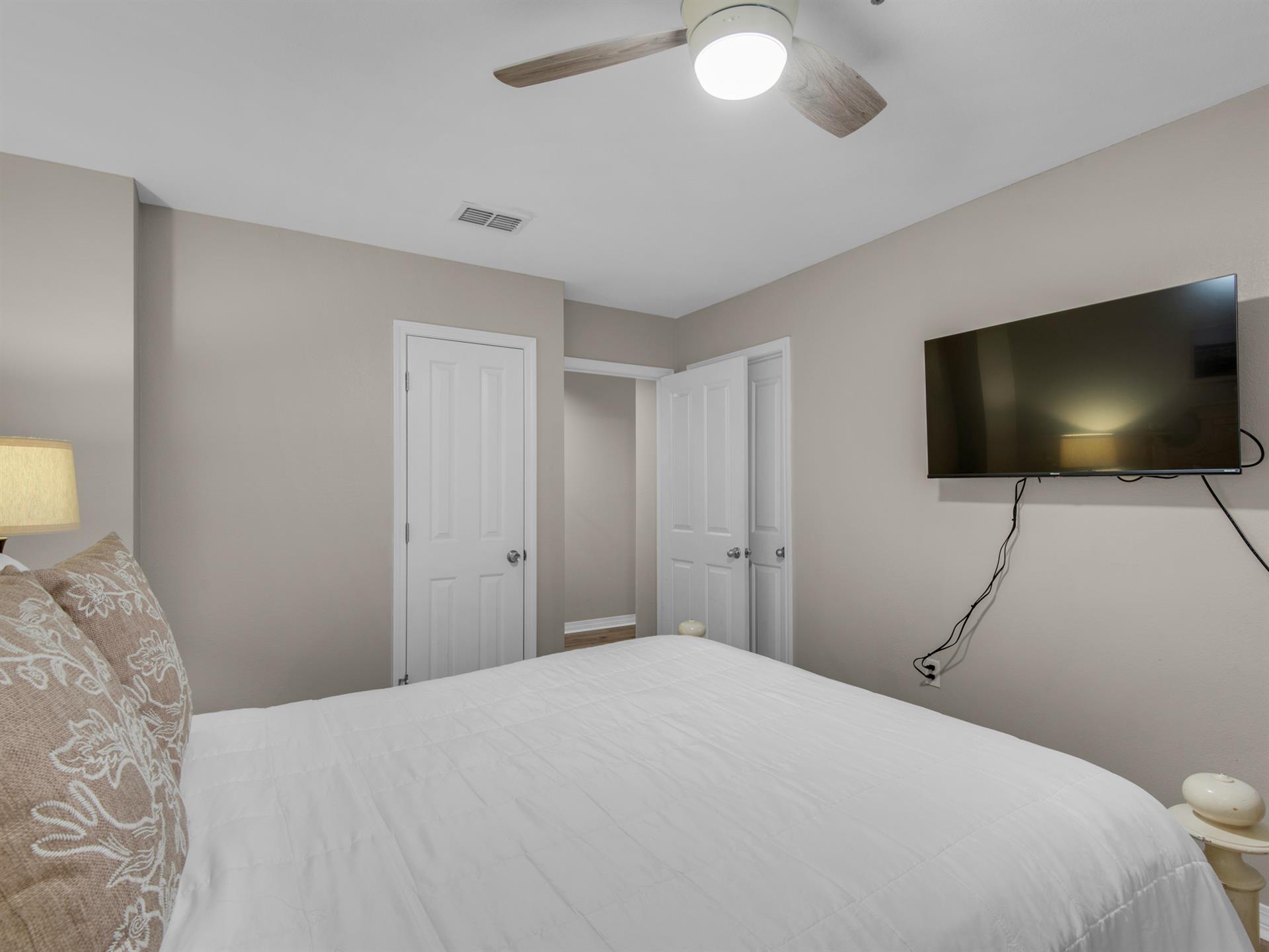 Bedroom 2 with Queen Bed and Flat Screen TV