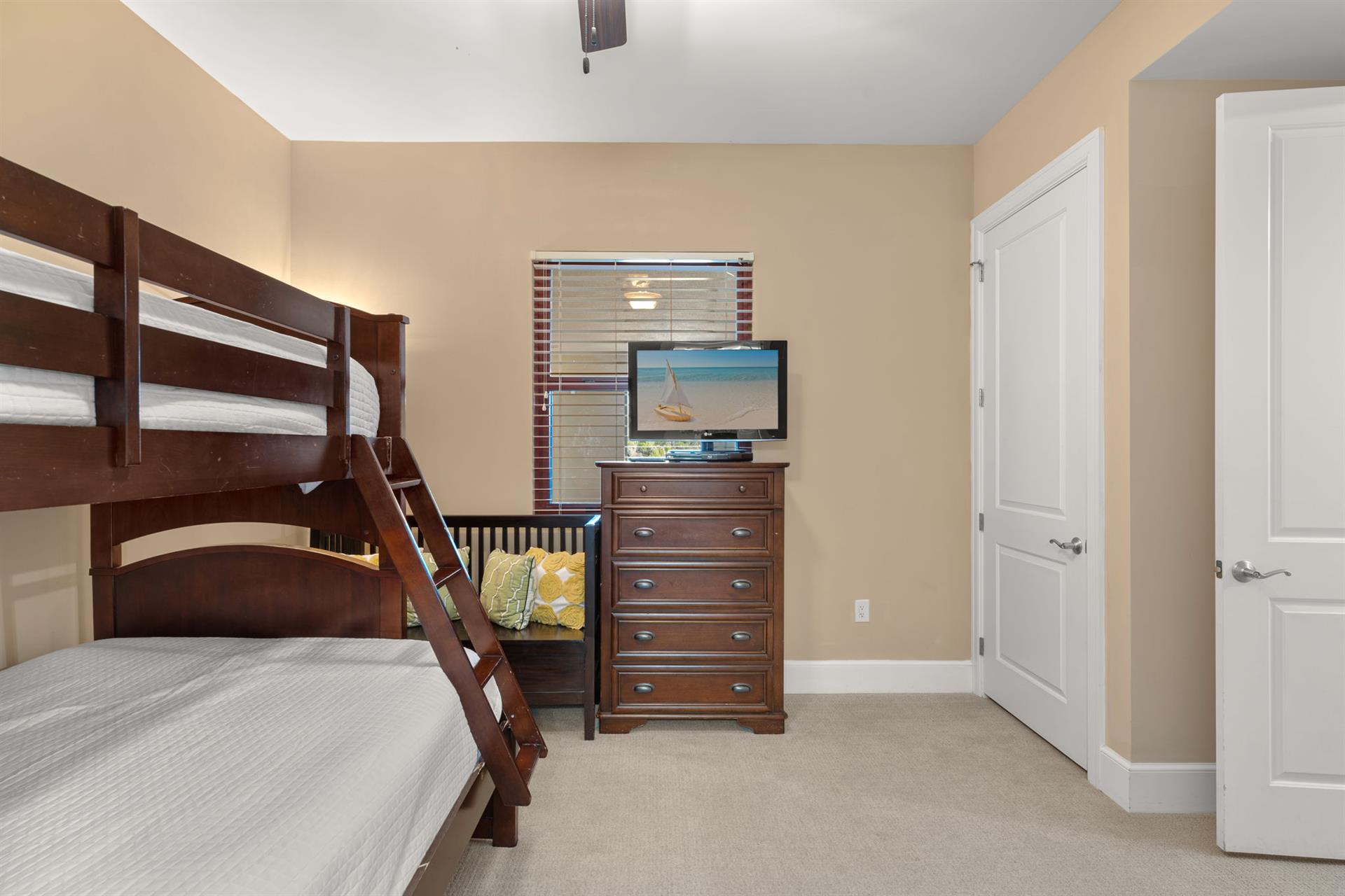 Your kids will love this cozy twin over full size bunk bed setup with entertainment center and plenty of storage for their adventures.