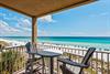 The private balcony offers stunning views of emerald waters and sugarwhite sand.