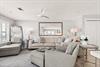 Unwind in this serene, lightfilled living room