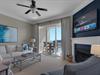 Spacious living area with large TV