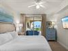 Primary Bedroom with King Bed and Private Balcony Access
