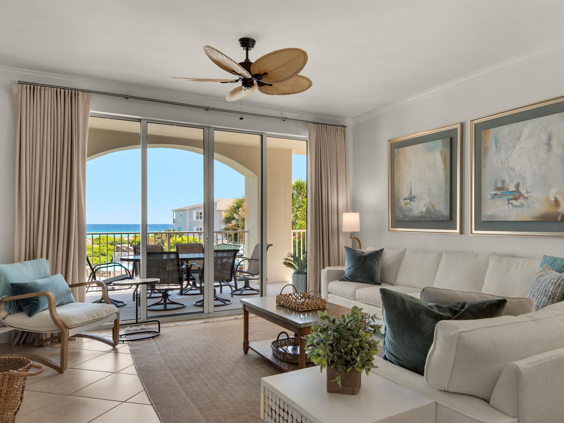 Living area with balcony access and Gulf views