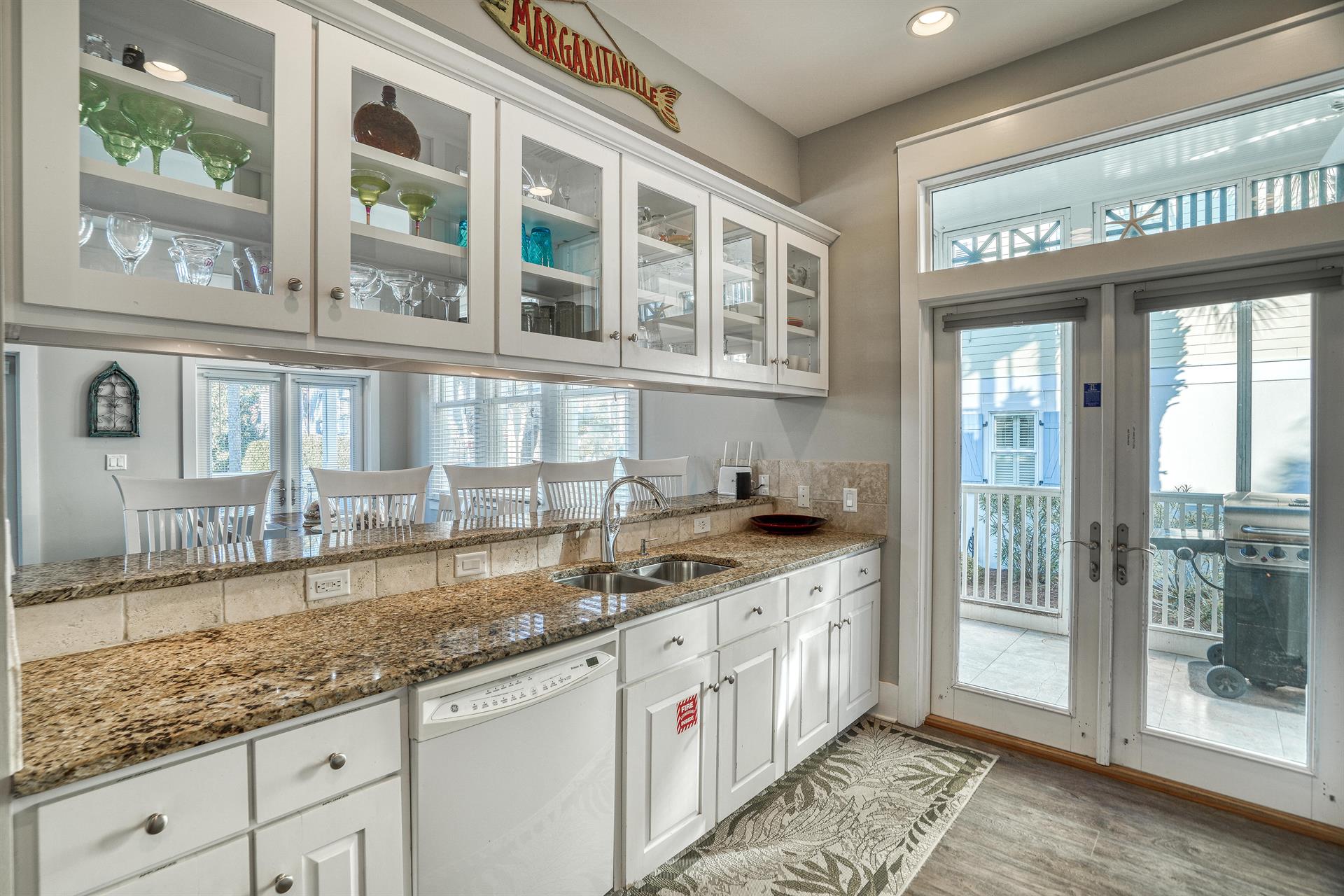 Beautiful custom cabinetry  easy access to your propane grill.