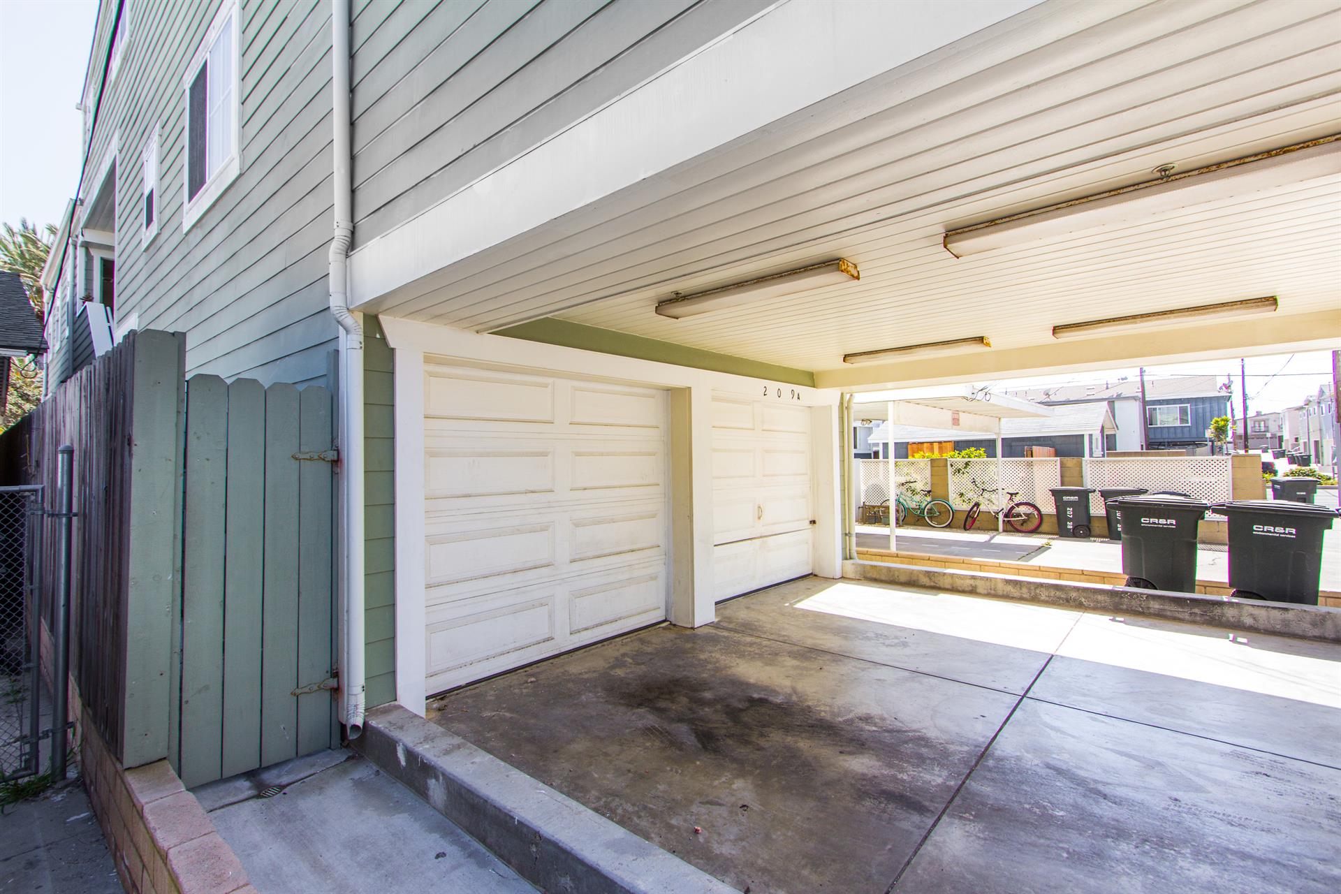 1 garage spot and 1 carport parking behind it tandem.