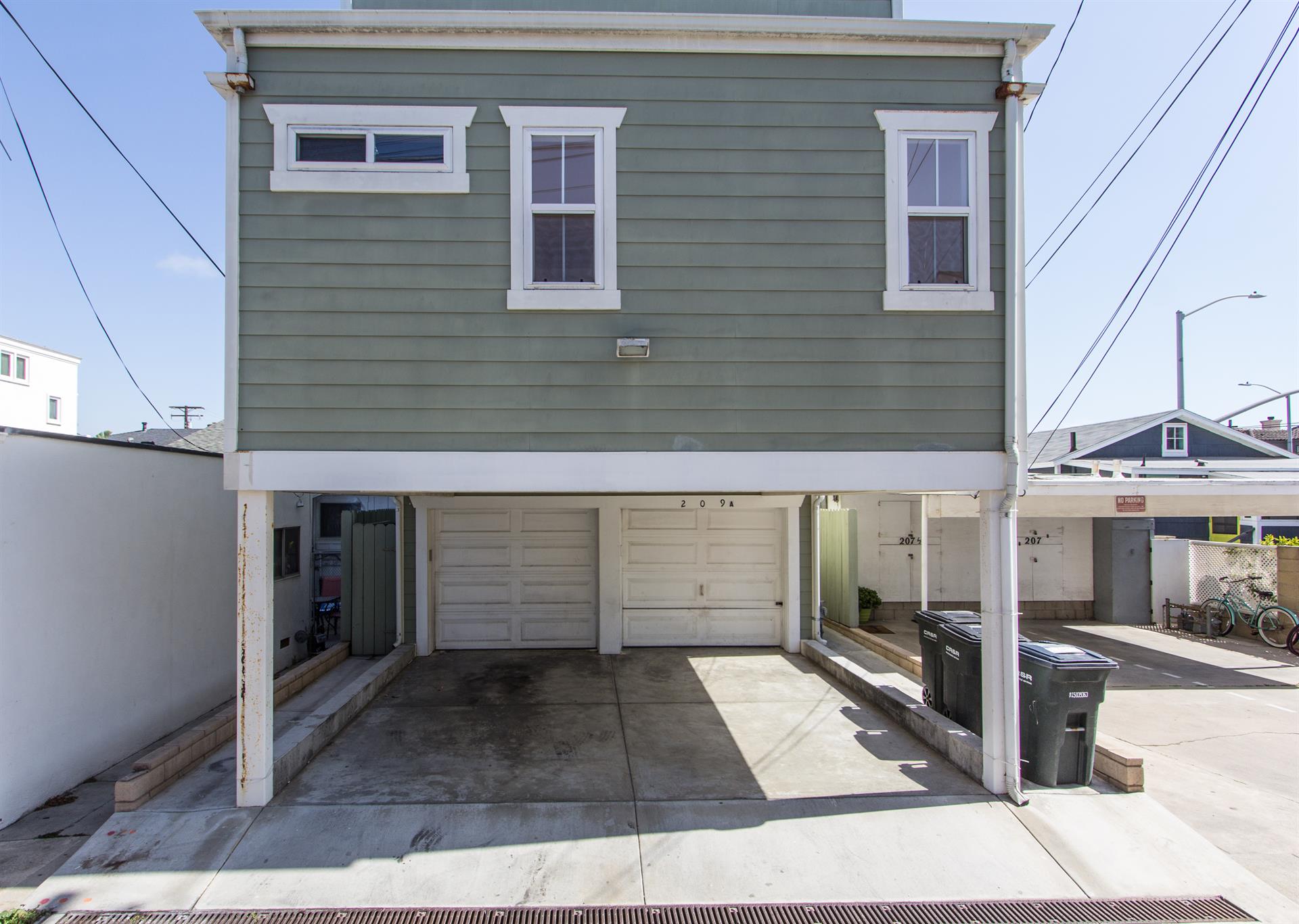 1 garage spot and 1 carport parking behind it tandem.