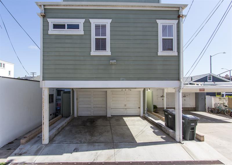 1 garage spot and 1 carport parking behind it tandem.
