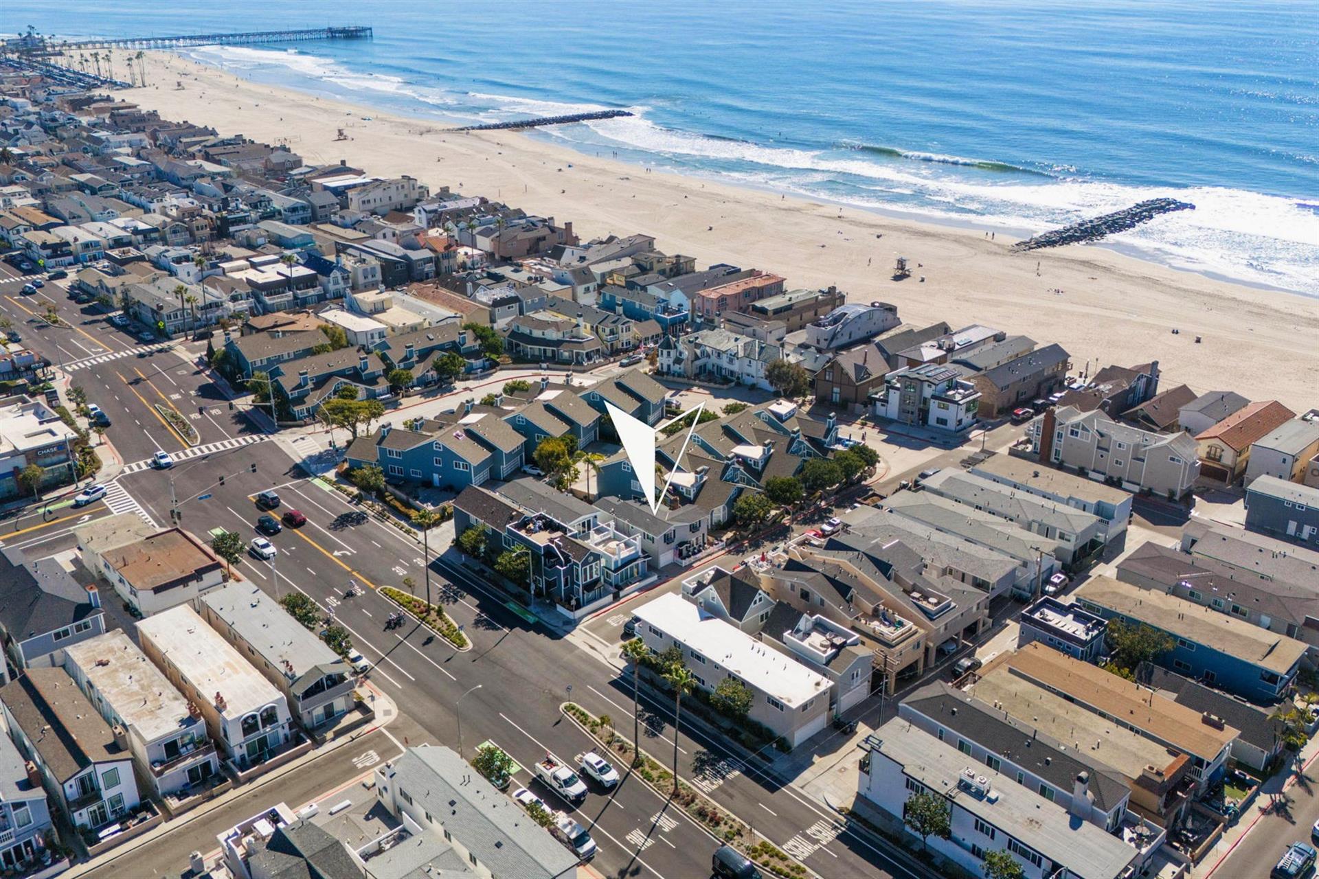 Areal view of home  surrounding area