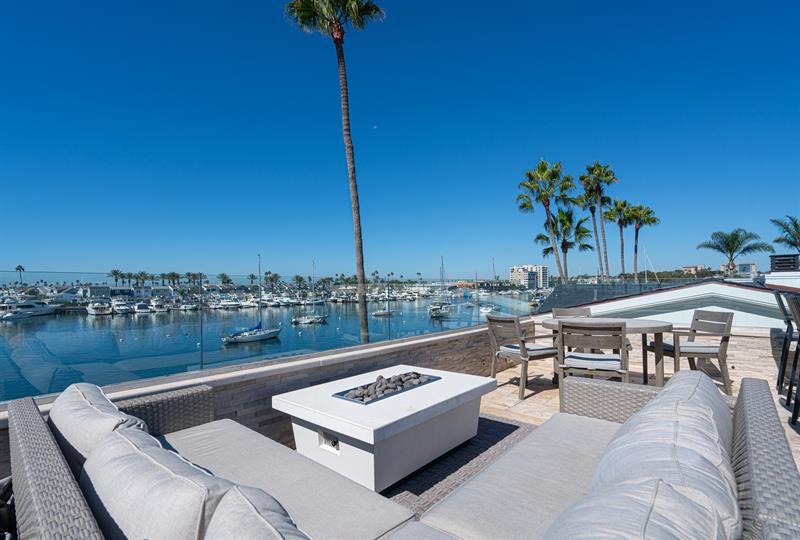 Upstairs open patio firepit  View