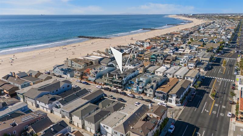 Aerial view of area with home pinpoint