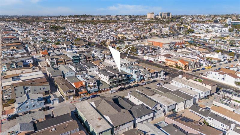 Aerial view of area with home pinpoint