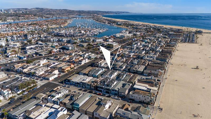 Aerial view of area with home pinpoint