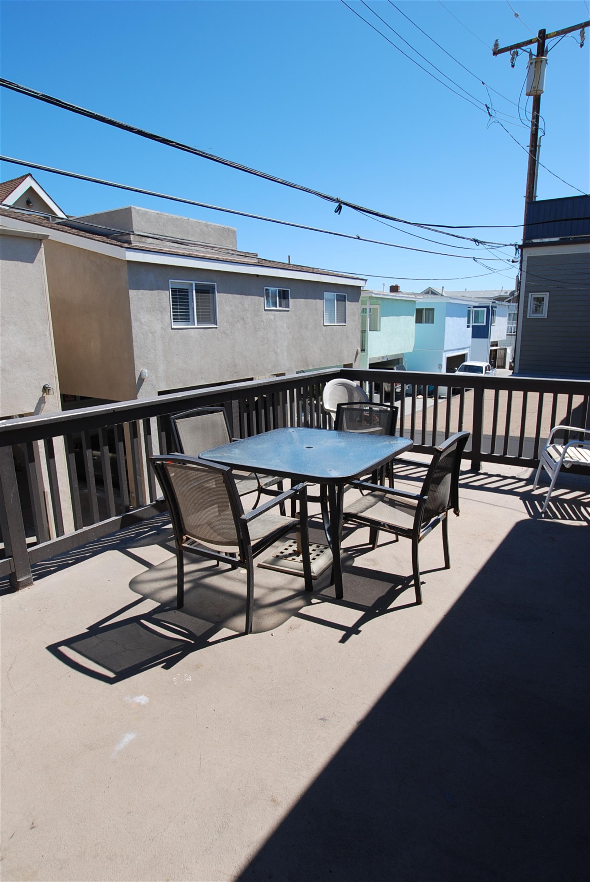 Upper back deck dining area