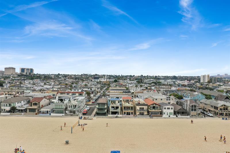 Aerial view of the home and beach