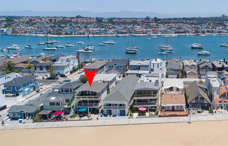 Aerial view of area with pinpoint of home