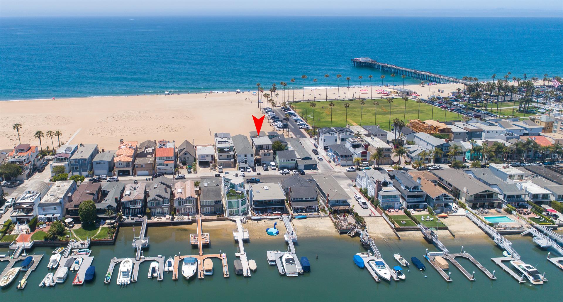 Aerial view of area with pinpoint of home