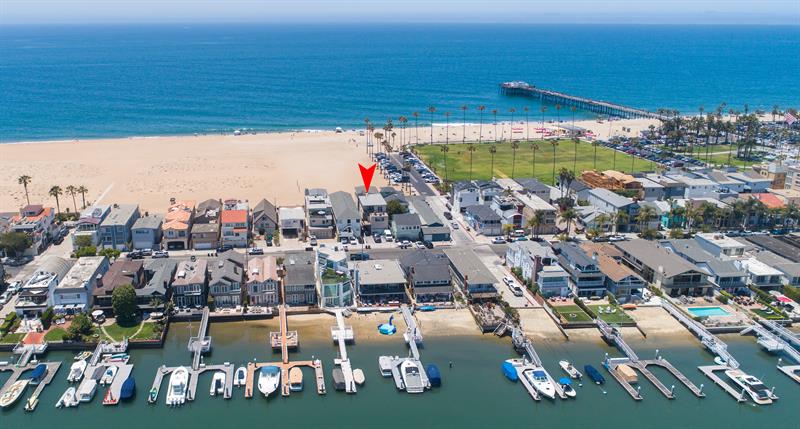 Aerial view of area with pinpoint of home