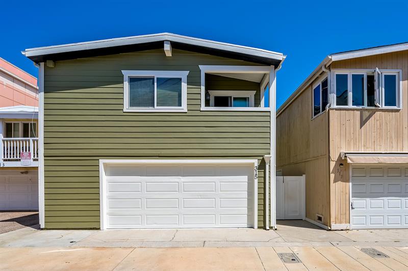 View of home from alleyway