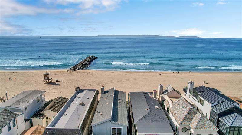 Aerial view of the home on the beach
