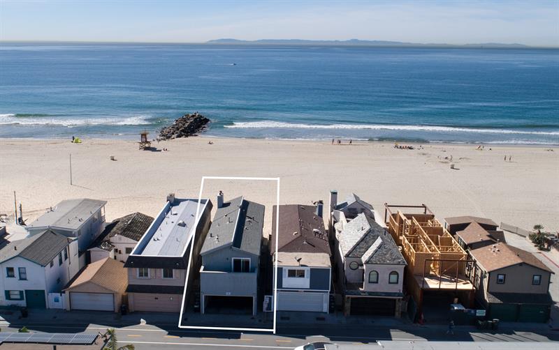 Aerial view of the home on the beach