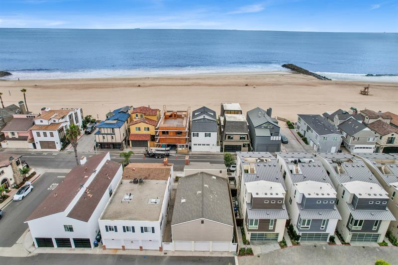 Aerial view of home near beach