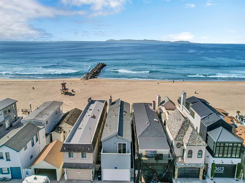 Aerial view of the home on the beach