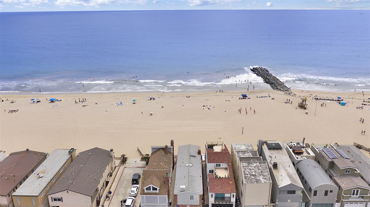 Aerial view of home and beach