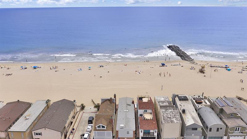 Aerial view of home and beach