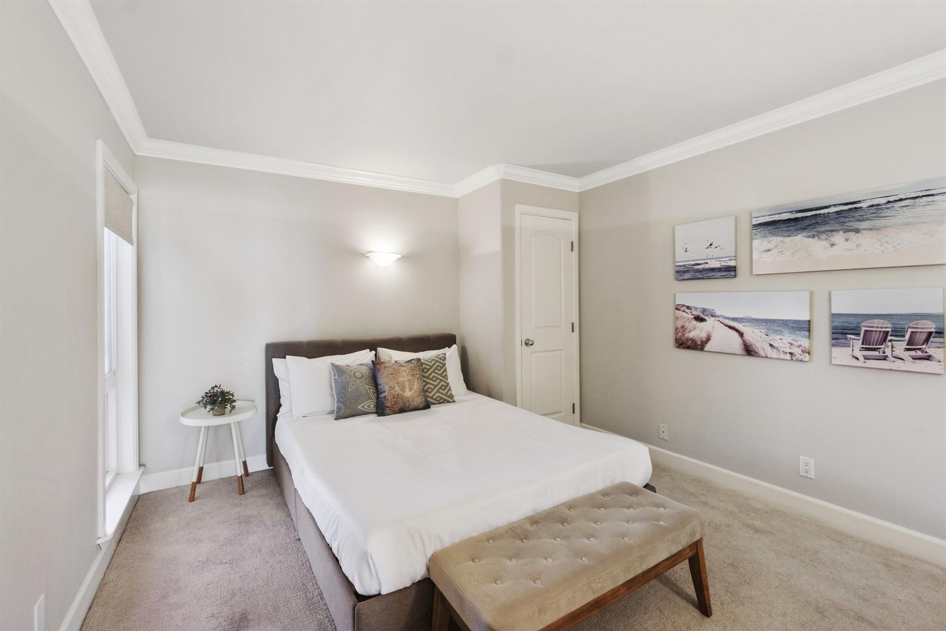 Secondary bedroom with an ensuite full bathroom