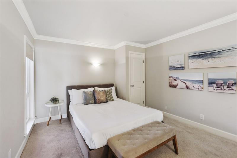 Secondary bedroom with an ensuite full bathroom