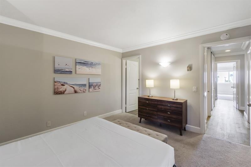 Secondary bedroom with an ensuite full bathroom