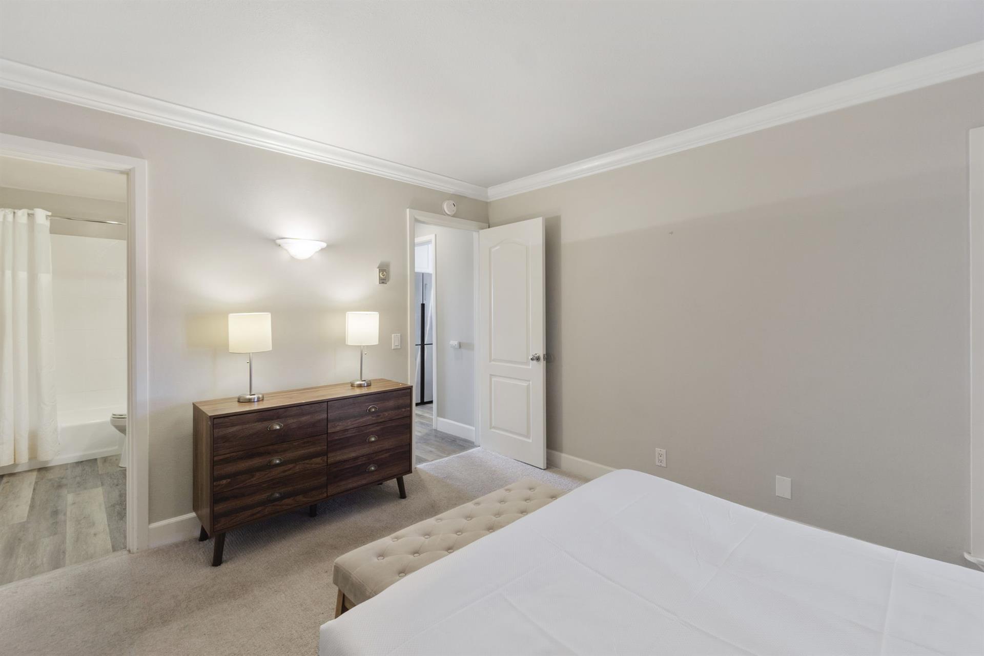Secondary bedroom with an ensuite full bathroom