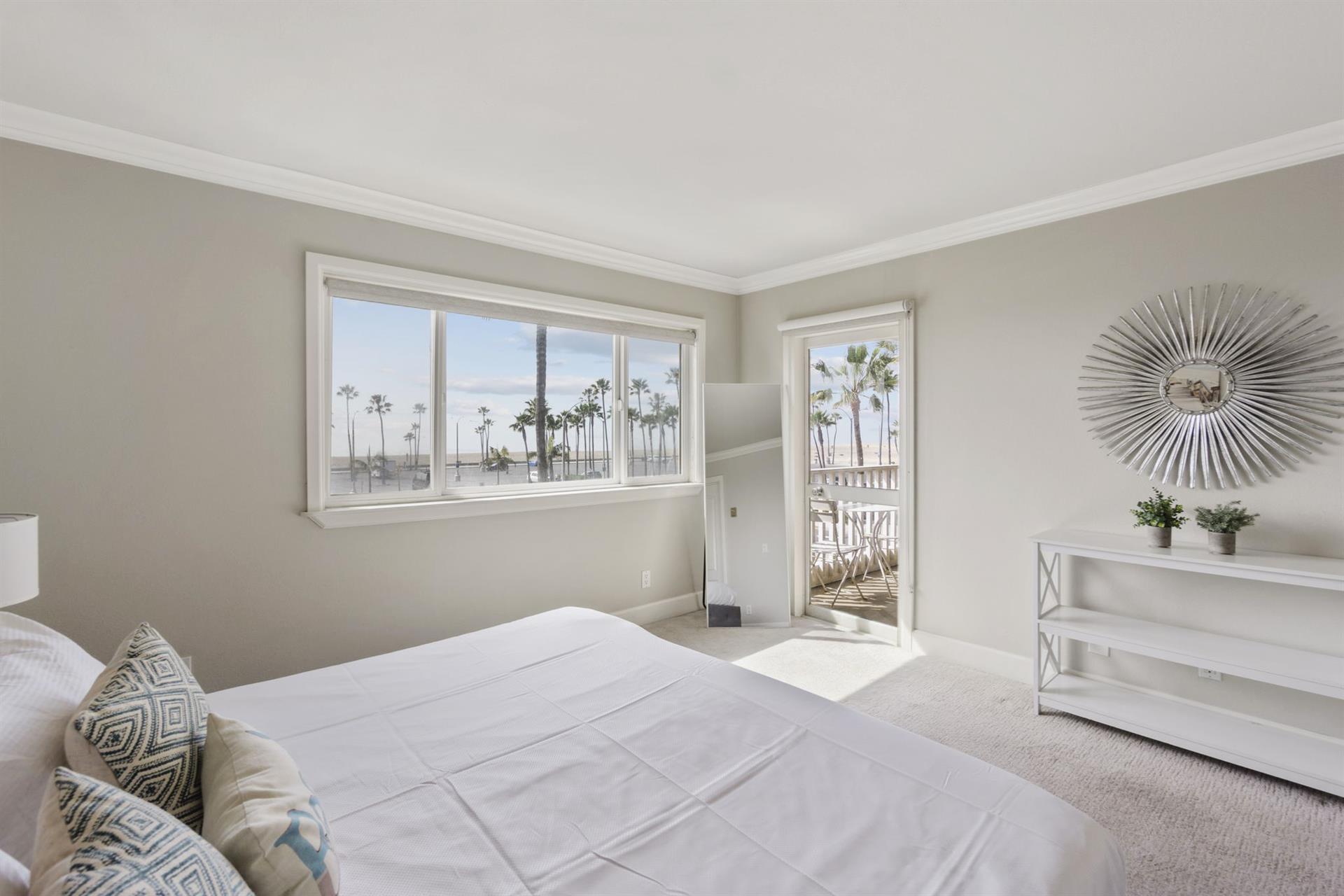 Master bedroom with access to the ocean front balcony