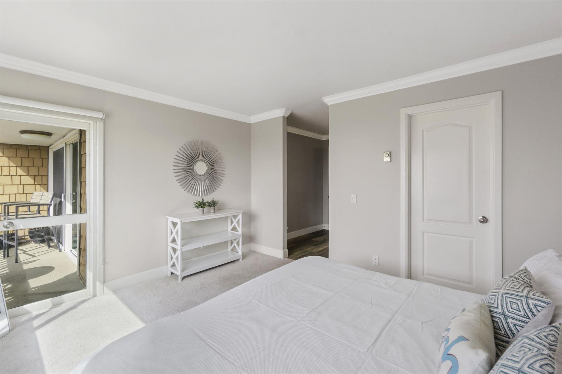 Master bedroom with access to the ocean front balcony