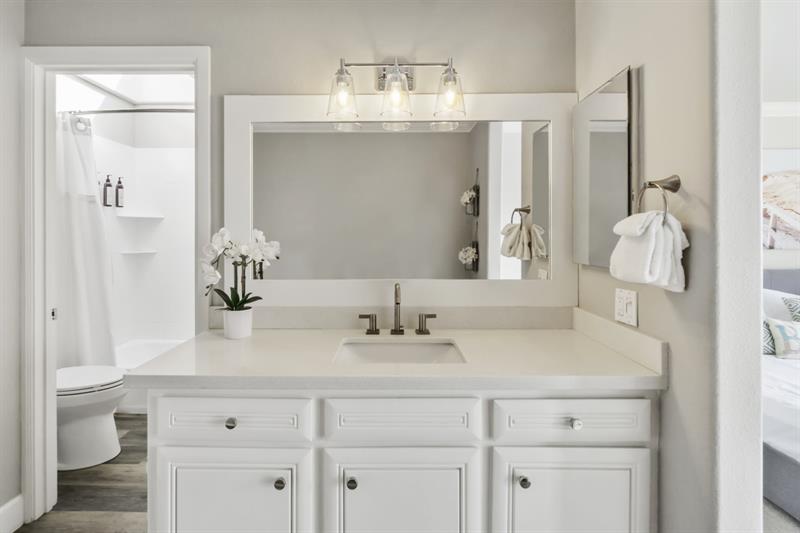 Ensuite bathroom with private shower and tub