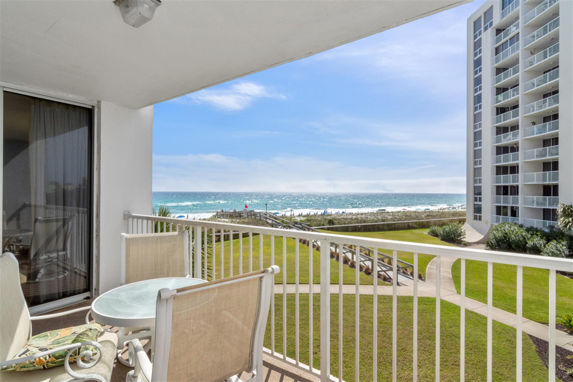 Balcony View of Courtyard and Beach