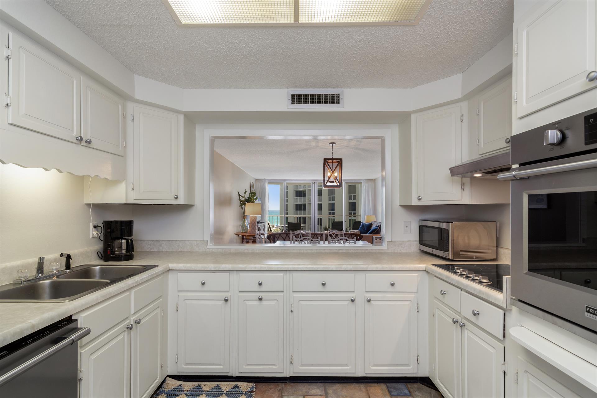 Kitchen with dining room pass thru