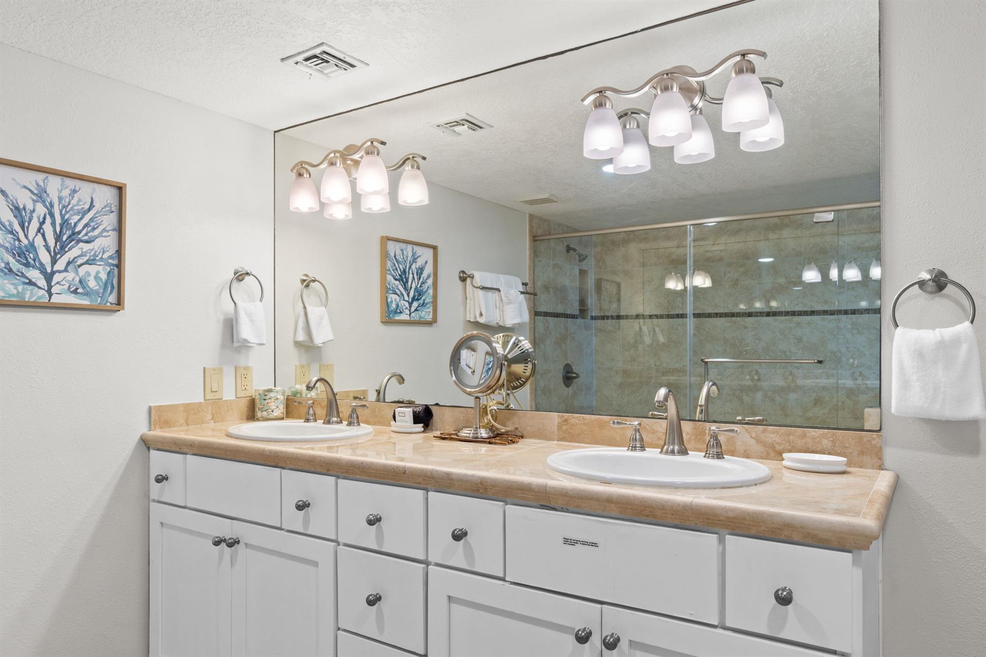 Primary bath with double sink vanity.