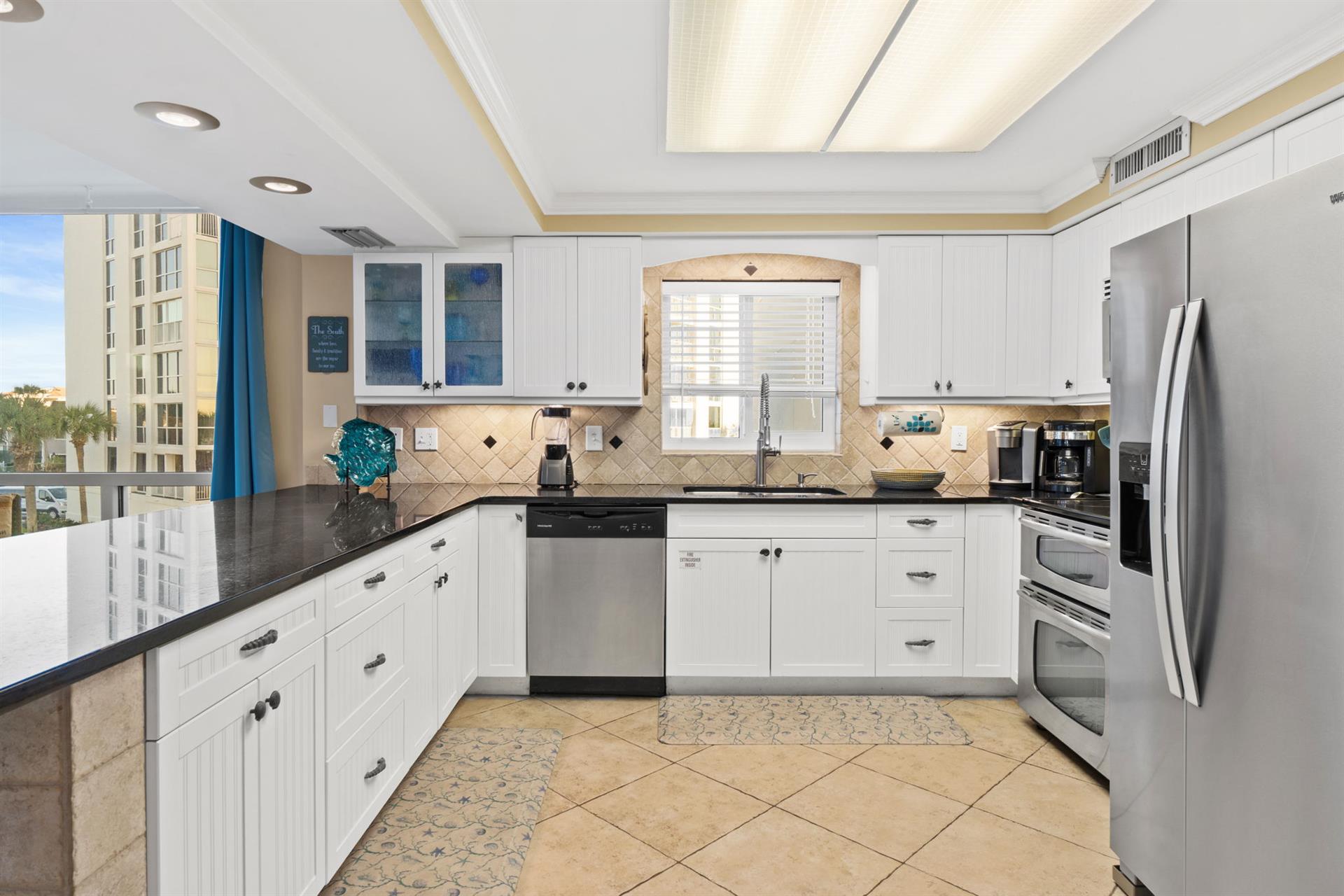 Kitchen with granite countertops.