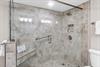Primary Shower with Bench and Safety Bar