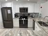Kitchen with all stainless appliances