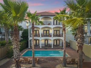 Backyard, heated pool, balconies with a gulf view and patio