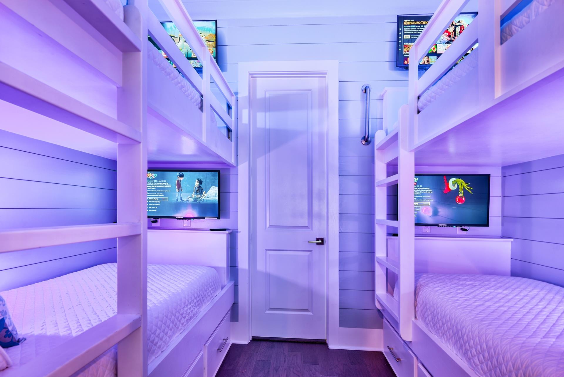 Second floor bunk beds with personal T.V.s
