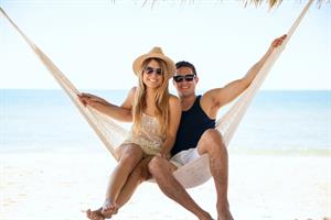 307434 Couple In Hammock On The Beach S