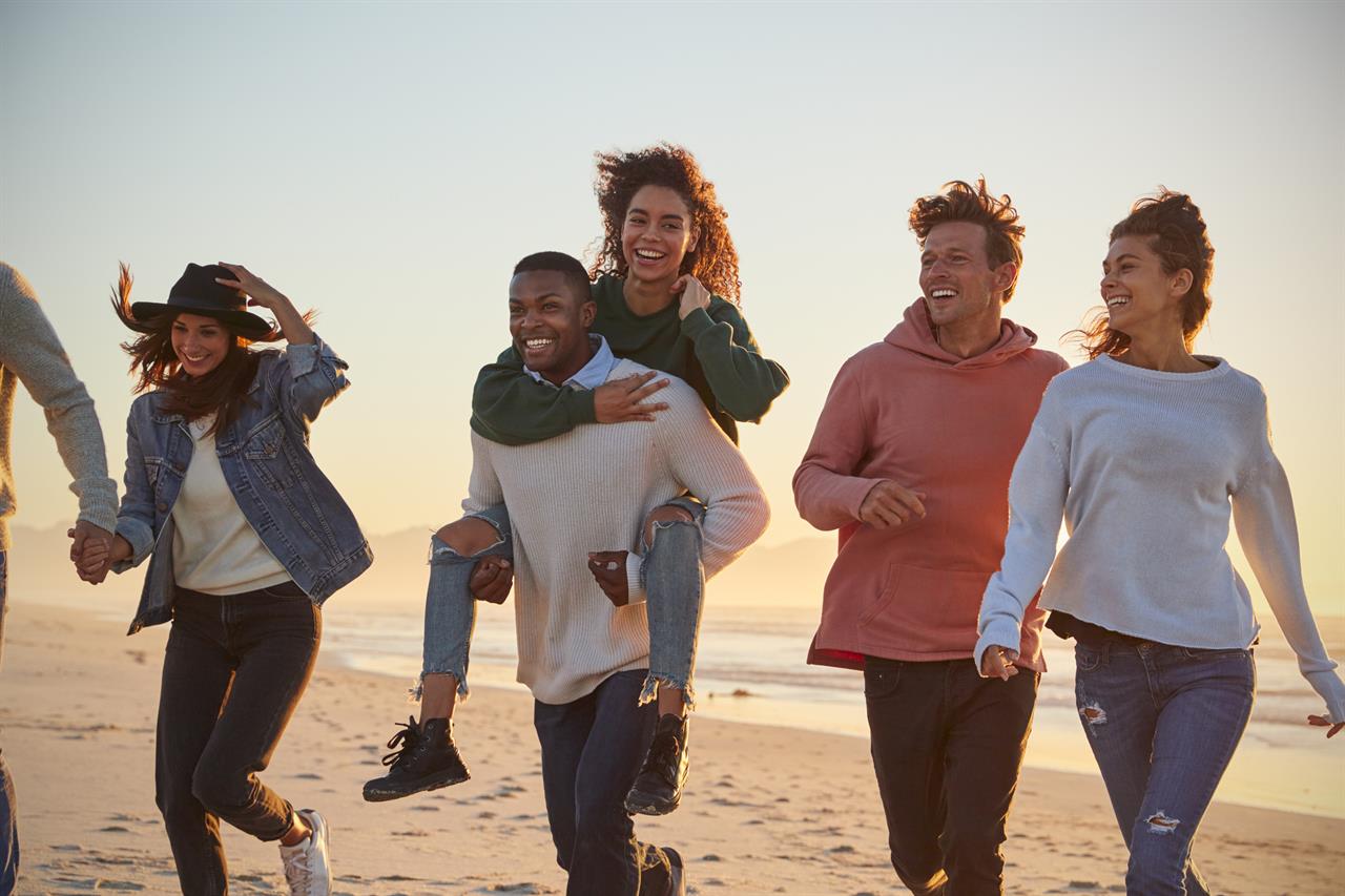 422777 Friends On Beach In Fall B