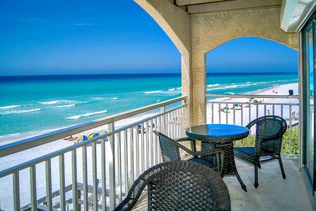 Sterling Resorts upscale balcony with wicker  furniture and panoramic view of the beach and Gulf along Highway 30-A