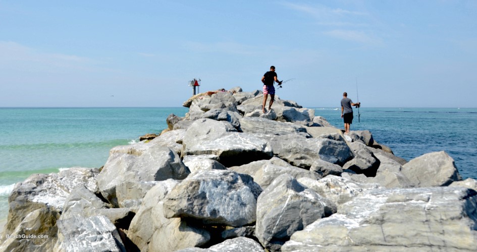 Fishing from rock jetty near Destin, Florida