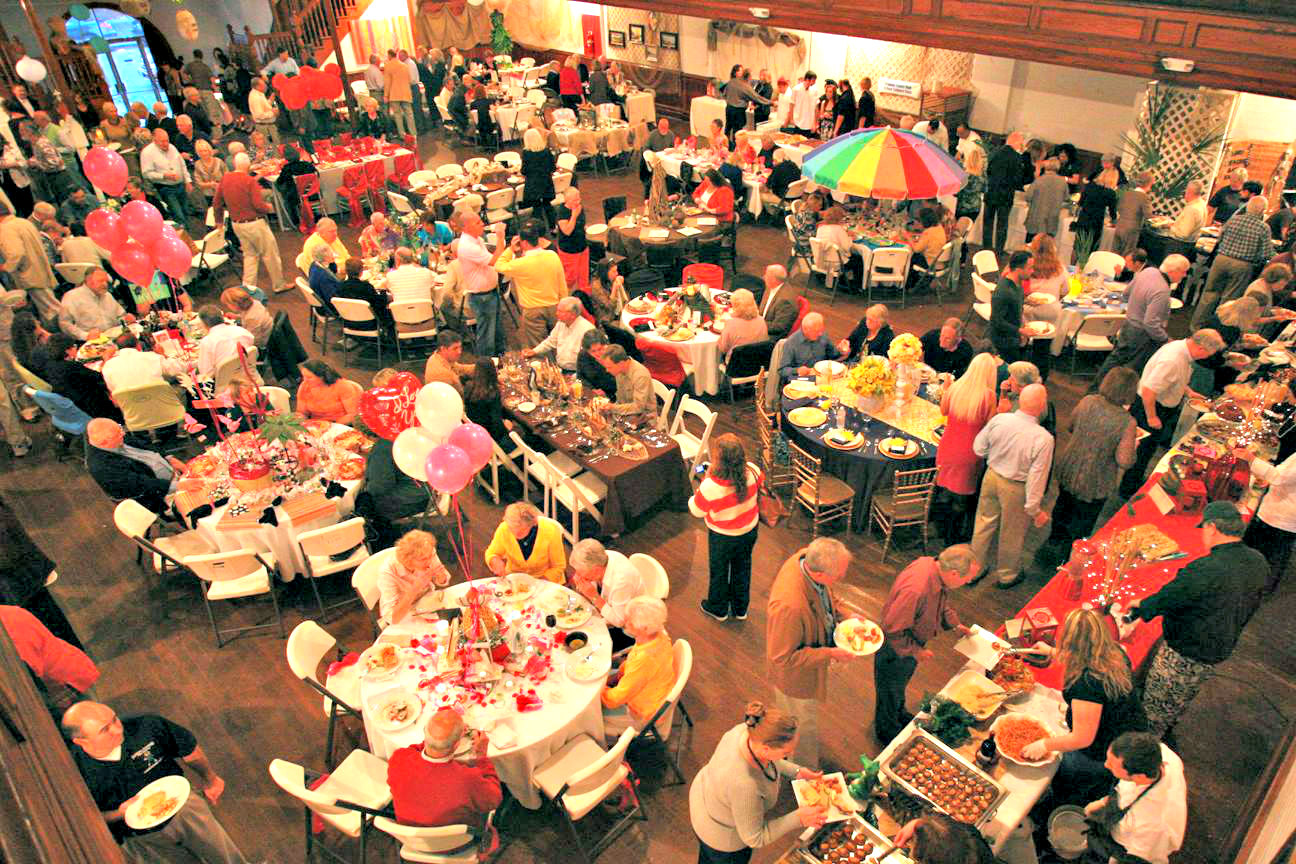 Crowd of diners enjoying food prepared by local chefs during the annual Forgotten Coast Chefs Sampler