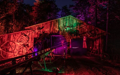 Eerie looking barn and coaster